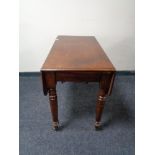 A Victorian mahogany Pembroke table