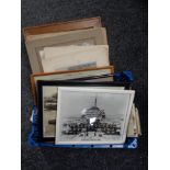 A basket of twentieth century military monochrome photographs and postcards