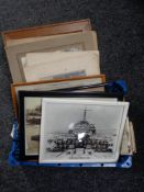 A basket of twentieth century military monochrome photographs and postcards