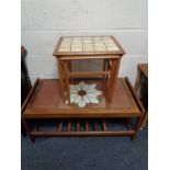 A 20th century teak tiled topped coffee table and nest of two teak tiled topped coffee tables