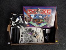 A box of Newcastle and Gateshead edition Monopoly, Newcastle United shirt, magazines,