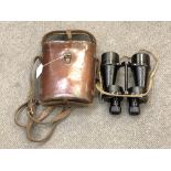A pair of WWII era Rino Prism No5 Mk2 binoculars in leather case