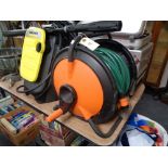 A hose on reel with attachments