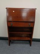 A 1930's oak lady's bureau