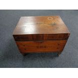 A Victorian inlaid mahogany storage chest with lion mask handles 61 cm x 44.5 cm x 46 cm.