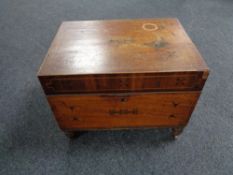 A Victorian inlaid mahogany storage chest with lion mask handles 61 cm x 44.5 cm x 46 cm.