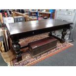 An Edwardian oak refectory dining table