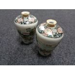 A pair of Noritake vases depicting Geisha, height 20 cm.