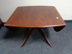 A Stag Minstrel flap sided pedestal coffee table