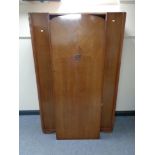 A 20th century single door oak wardrobe