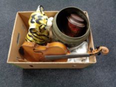 A box of chalk figure of a lion cub, violin, brass embossed planter,