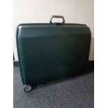 Two Samsonite hard shell luggage cases