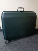 Two Samsonite hard shell luggage cases