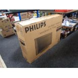 A boxed Philips 32 inch lcd tv