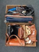 Two boxes of lady's leather hand bags, holdalls,