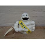 A metal novelty money box - Michelin man