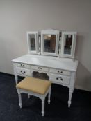 A painted pine five drawer kneehole dressing table with mirror and stool