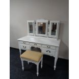 A painted pine five drawer kneehole dressing table with mirror and stool