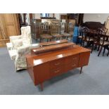 A mid 20th century teak dressing table