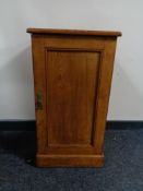 An Edwardian pine pot cupboard