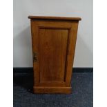 An Edwardian pine pot cupboard