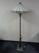 An Art Deco style floor lamp with leaded glass shade