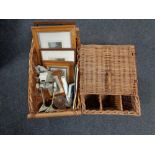 A wicker picnic basket and log basket containing framed prints, star wars walker,