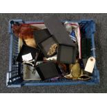 A basket of costume jewellery, beaded purses,