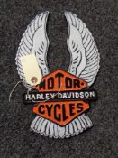 A metal Harley Davidson plaque