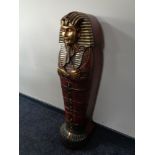A contemporary CD cabinet in the form of an Egyptian mummy 125 cm x 31 cm x 34 cm