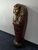 A contemporary CD cabinet in the form of an Egyptian mummy 125 cm x 31 cm x 34 cm