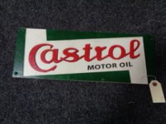 A metal Castrol motor oil plaque