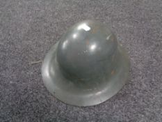 A twentieth century tin helmet