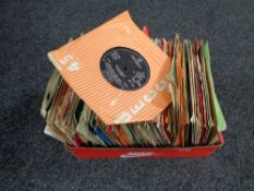 A box of vinyl 45's,