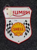 A metal Triumph / Shell plaque