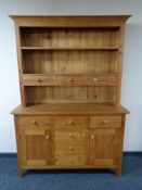 A contemporary pine kitchen dresser