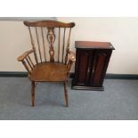 A beech kitchen armchair and a double door cabinet
