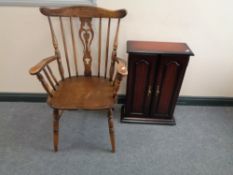 A beech kitchen armchair and a double door cabinet