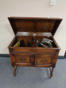 An early 20th century Gilbert gramophone with cabinet and spare turn table