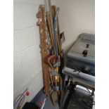 A pair of folding garden steps and four bundles of assorted garden tools
