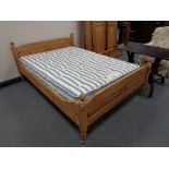 A pine bed frame with Sleepeezee 4'6 pocket bedstead 1000 mattress