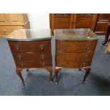 A pair of mahogany three drawer bedside chests