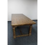 A good quality mixed wood mosaic dining table on refectory style base CONDITION REPORT: