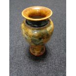 A Royal Doulton Lambeth stoneware vase with leaf decoration (a/f)