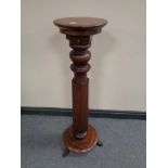 A Victorian mahogany torchere