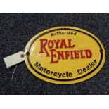A metal Royal Enfield plaque