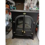 A double door Dimplex electric fire in the form of a stove