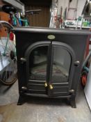 A double door Dimplex electric fire in the form of a stove