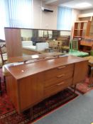 A mid 20th century teak dressing table