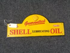 A metal Shell lubricating oil plaque